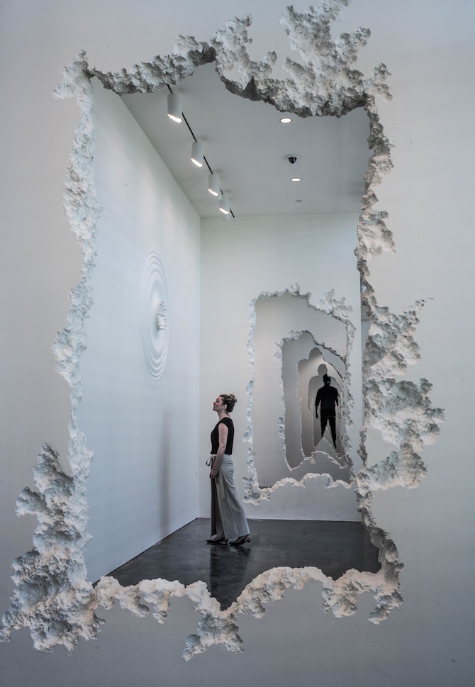 an excavated wall installation by daniel arsham