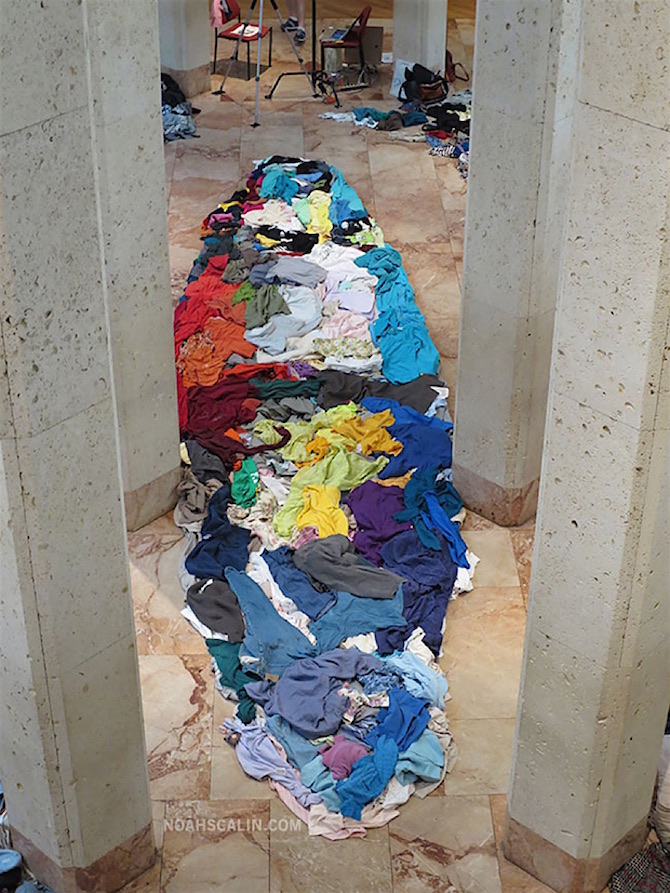 A Giant Anamorphic Portrait Created From Arranged Clothing | iGNANT.com