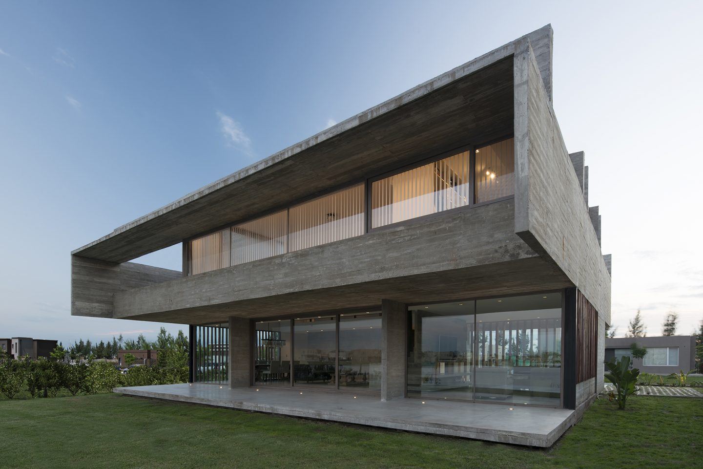 Luciano Kruk’s Latest Clean-lined Concrete Home Overlooks A Lagoon In 