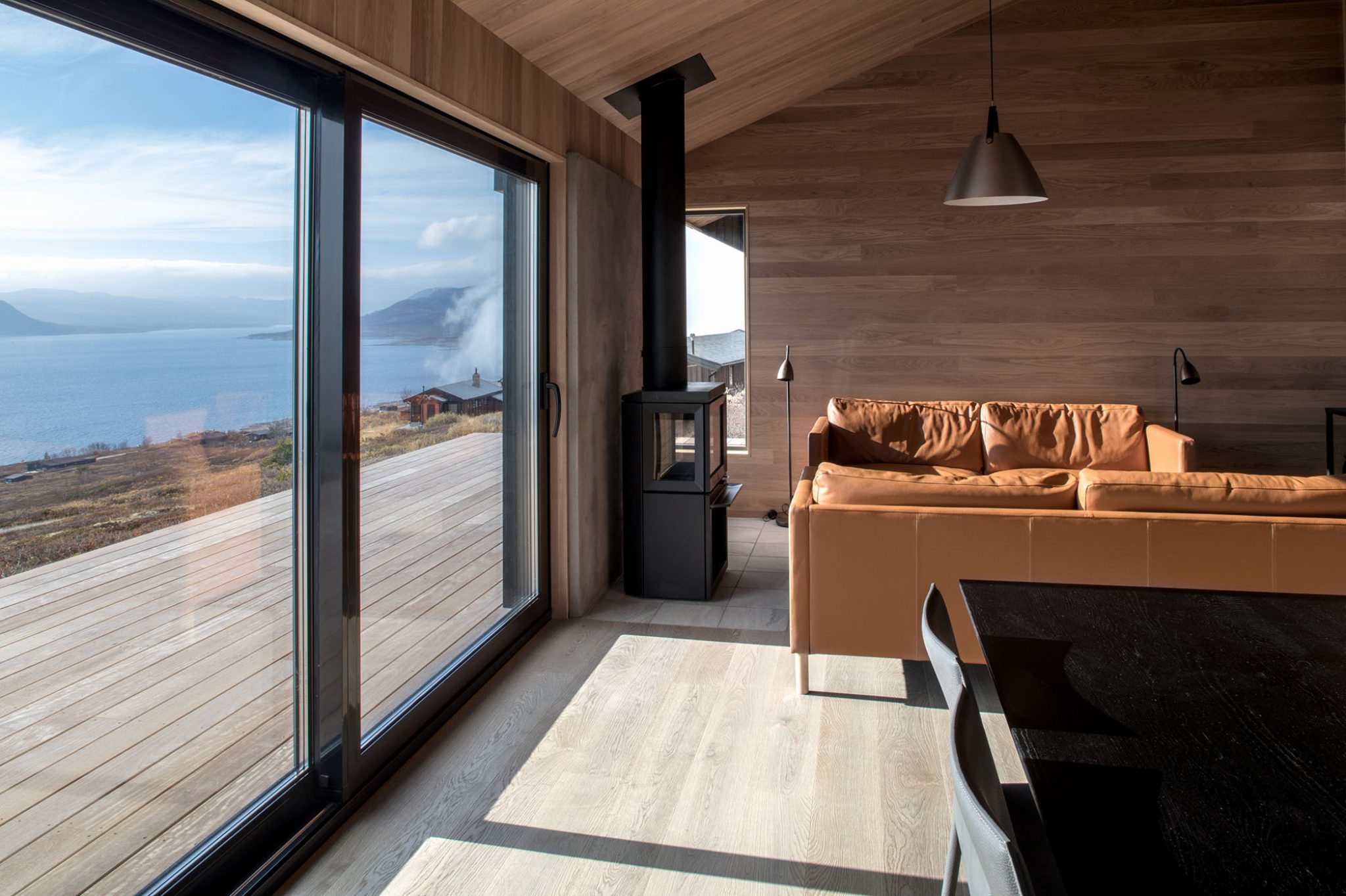 A Robust, Hooded Cabin On Top Of A Mountain Withstands Norway’s Weather ...