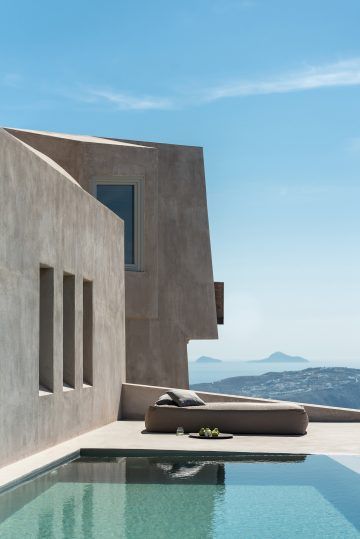 A Monolithic Hilltop Residence In Santorini Is Rooted To Its Historic ...